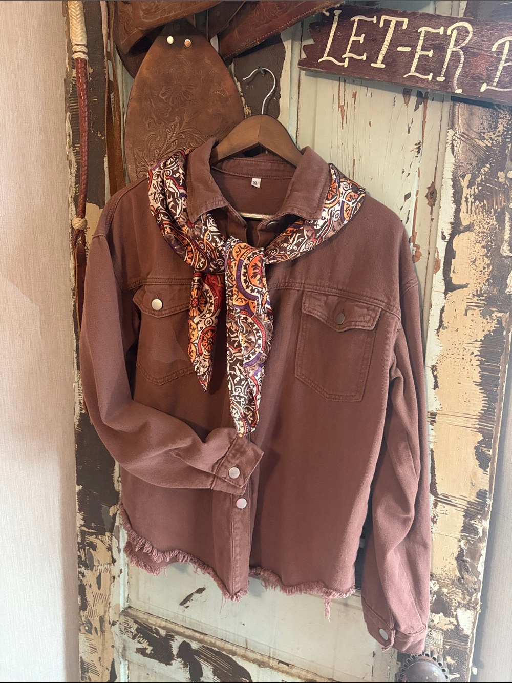 Women’s Distressed Brown Denim Jacket with Button Front